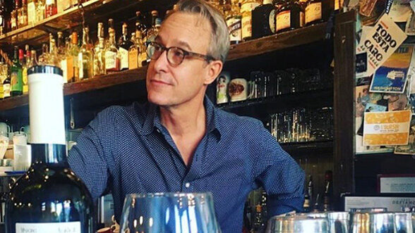 John Tebeau, author/artist/professional host behind the bar at Brooklyn's Fort Defiance. (Image: Alex Halberstadt.)