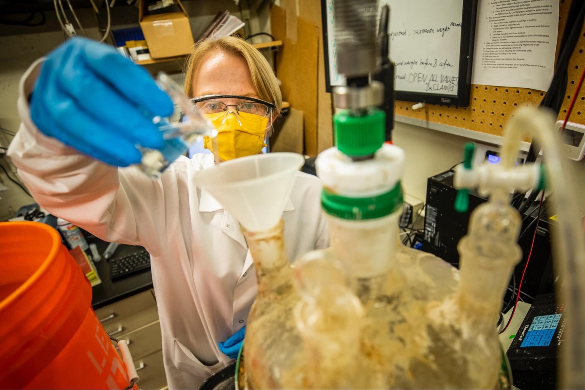 Renata Rae Strarostka, a graduate research assistant, works in the lab.