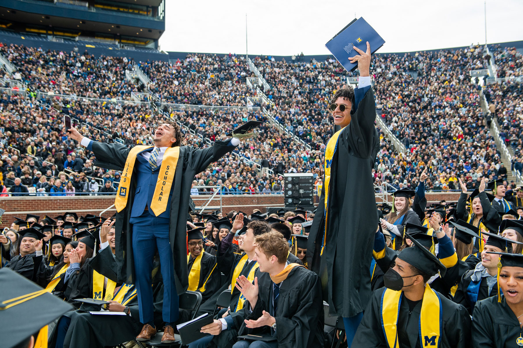 Michigan basketball players at commencement