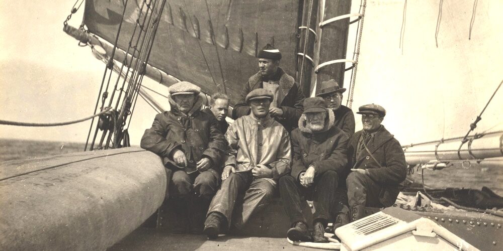 Explorers, circa 1920s, aboard a ship en route to Greenland.