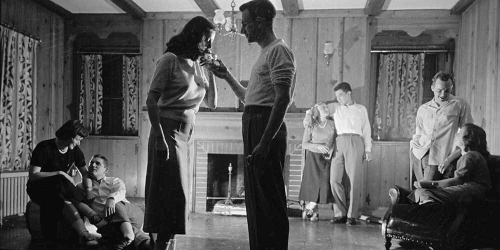 Black and white image of college party, co-ed, 1949, at University of Michigan Ann Arbor, by Stanley Kubrick for Look magazine.